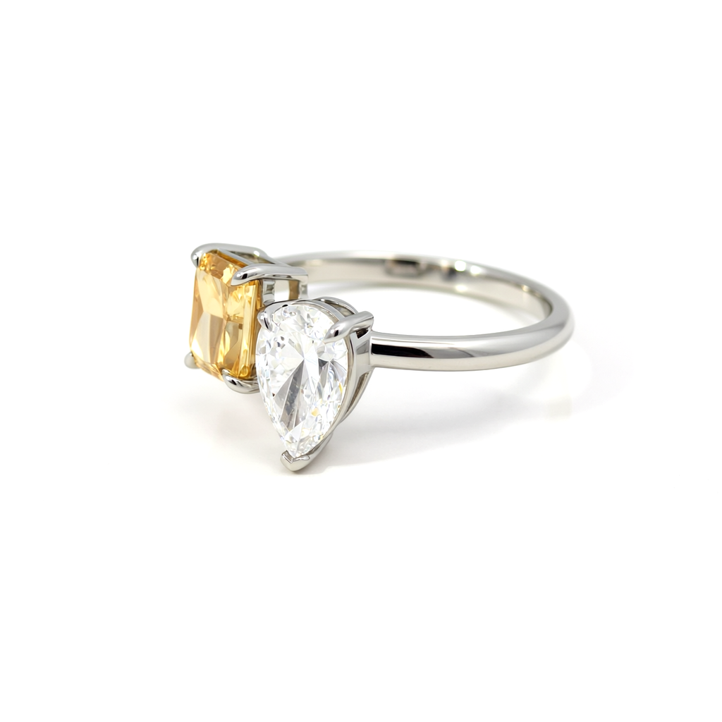 Angled shot of 47AU Toi et Moi ring with lab-grown diamond pair in Platinum 950
