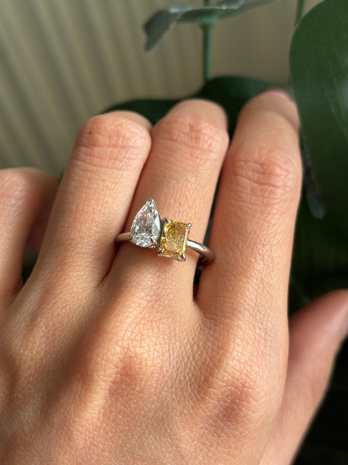 Model wearing 47AU Toi et Moi ring with yellow & white lab-grown diamonds in Platinum 950
