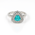 Front view of 47AU trilliant-cut synthetic Paraiba tourmaline imitation ring in 10K white gold with triple halo of lab-grown diamonds